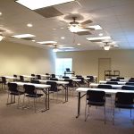 large meeting room for rent with tables and chairs